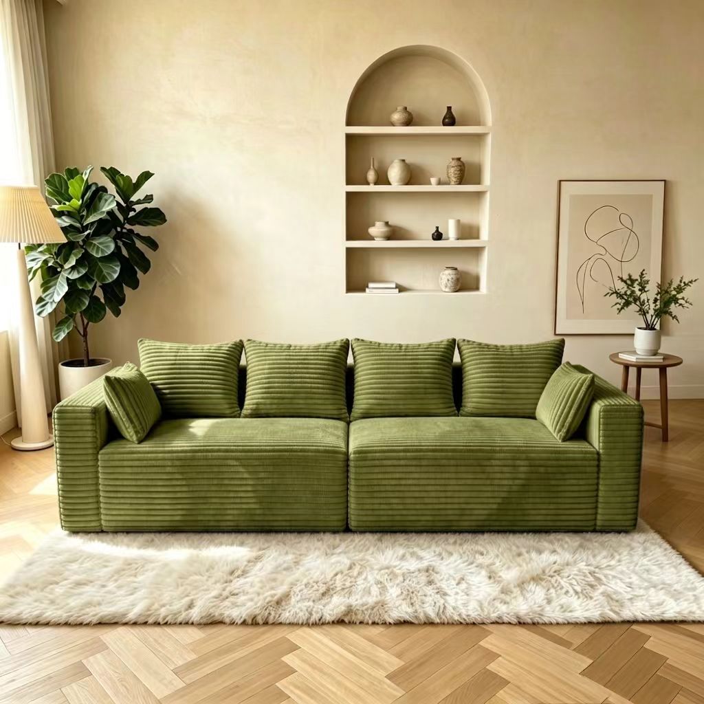 sage green wide-wale corduroy compression sofa for contemporary home decor.