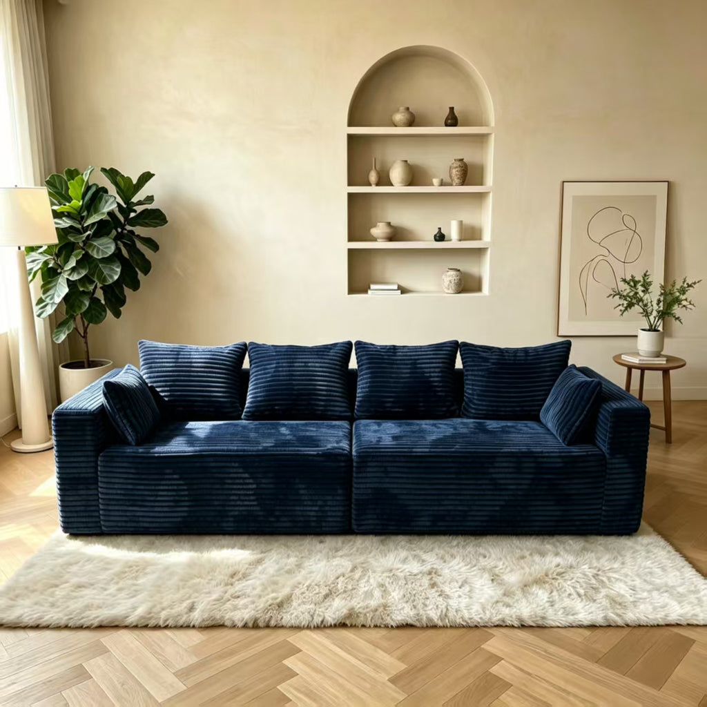 Navy blue corduroy sectional couch with comfortable armrests
